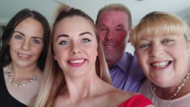 Abbey Forrest (left), her sister, Emily, and their parents. 