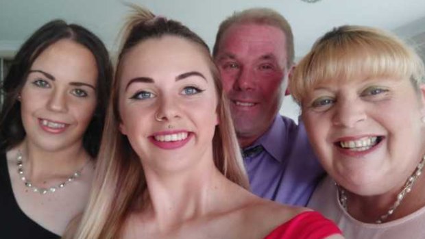 Abbey Forrest (left), her sister, Emily, and their parents. 