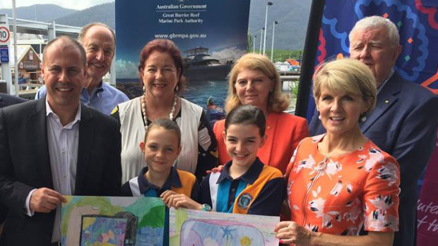 Josh Frydenberg and Julie Bishop flank two students at a Great Barrier Reef Foundation announcement in Cairns in April.