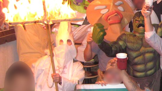 A fancy dress party at the unofficial Australian soldiers’ bar in Afghanistan, where Person 35 dressed as a member of the KKK.
