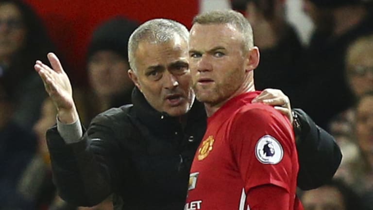 Wayne Rooney with his then manager at Manchester United, Jose Mourinho, in 2017.