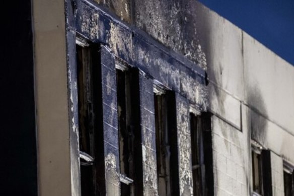 A close-up of the damage to Loafers Lodge exterior.