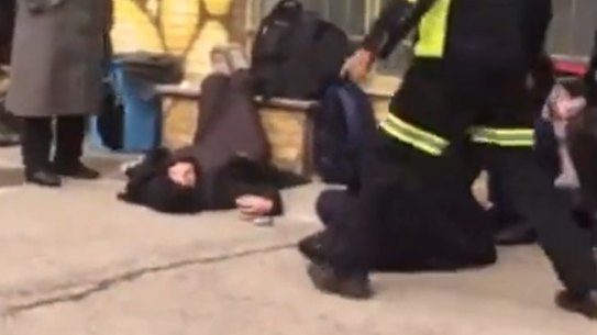 Iranian girls ill outside a school.