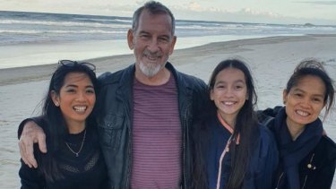 Sarah Caisip (left) is pictured with her father Bernard Prendergast, 11-year-old sister Isobel Prendergast and mother Myrna Prendergast.