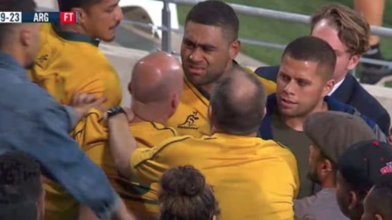Ugly: Lukhan Tui gets in an altercation with a Wallabies fan at Robina. 