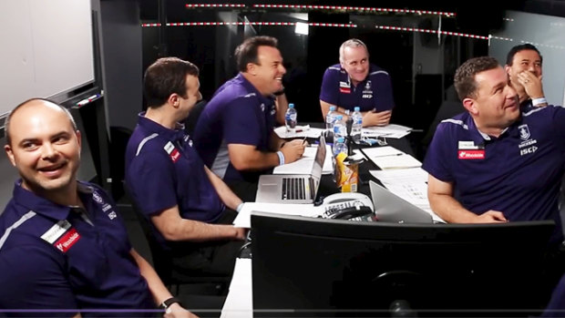 Fremantle staff react to new recruit Sam Sturt's speech at Marvel Stadium after being drafted.