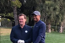 Aaron Erter (left) and Tiger Woods at the 2018 Valspar PGA golf championships in Florida