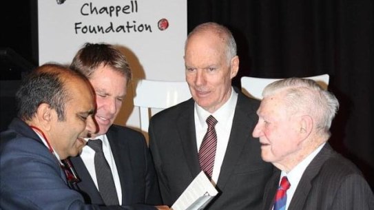 Shane Warne with the author, Greg Chappell, at a Chappell Foundation fundraiser.
