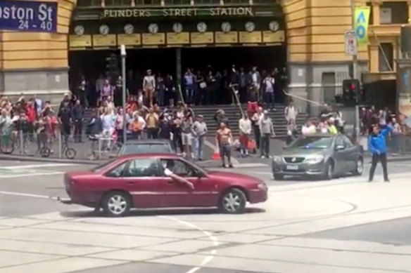 James Gargasoulas did "doughnuts" outside Flinders Street Station minutes before he murdered six people in Bourke Street.