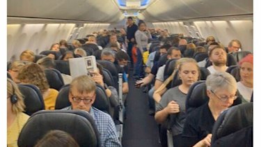 Passengers aboard Qantas flight QF171 while it was stranded at Ohakea military base.