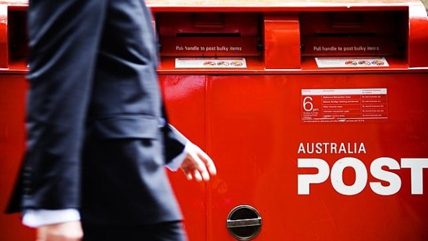 Australia Post has suspended its next-day delivery promise.