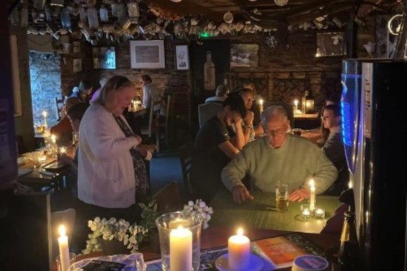 The Masons Arms, Camelford, Britain, using candles.