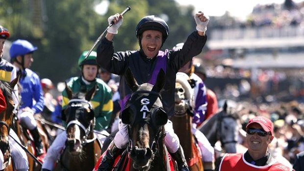 Jockey Damien Oliver on Fiorente after winning the 2013 Melbourne Cup.
