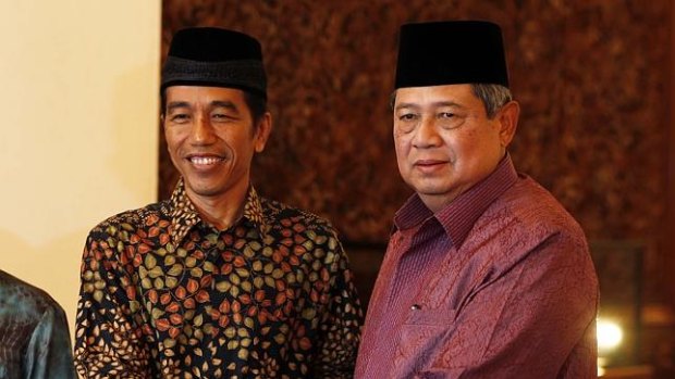 Outgoing president Susilo Bambang Yudhoyono (right), in 2014, with Joko Widodo.  