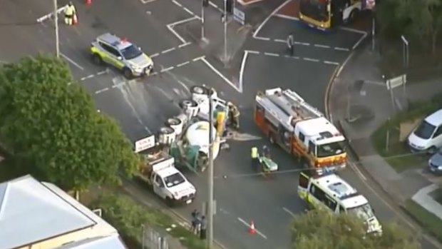 A truck rollover has caused delays at Greenslopes on Friday.