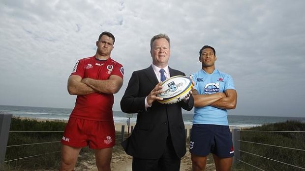 Former ARU Bill Pulver was all smiles at a Super Rugby launch, alongside James Horwill and Israel  Folau.