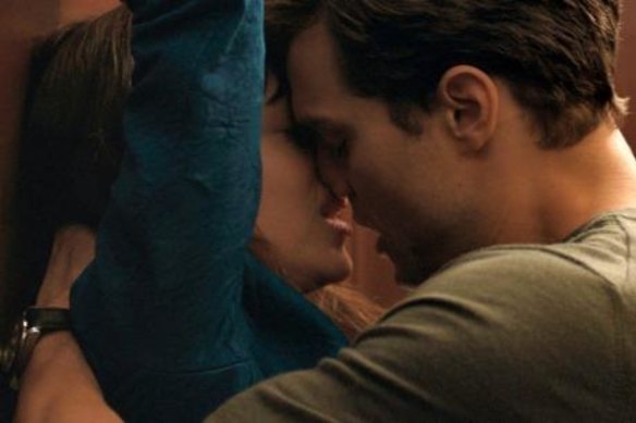Dakota Johnson, left, and Jamie Dornan in Fifty Shades of Grey.