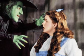 Judy Garland as Dorothy, with Margaret Hamilton as the Wicked Witch of the West.