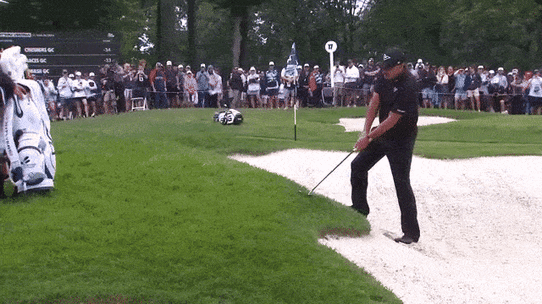 Phil Mickelson makes a birdie with a ridiculous golf shot.