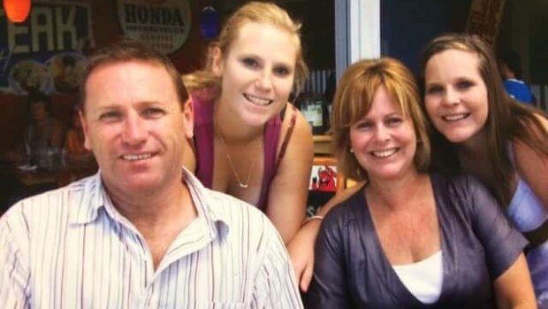 Tony Jenkins with his wife, Sharon and daughters Kim (left) and Cidney (right).