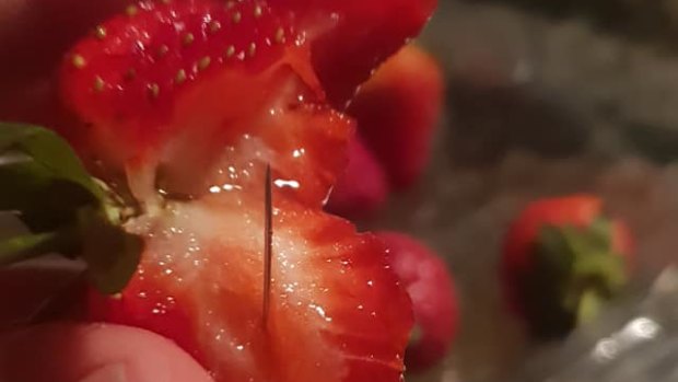 A woman in Wingham, NSW, posted pictures of strawberries with needles in them to Facebook, saying she purchased them at the local Coles.