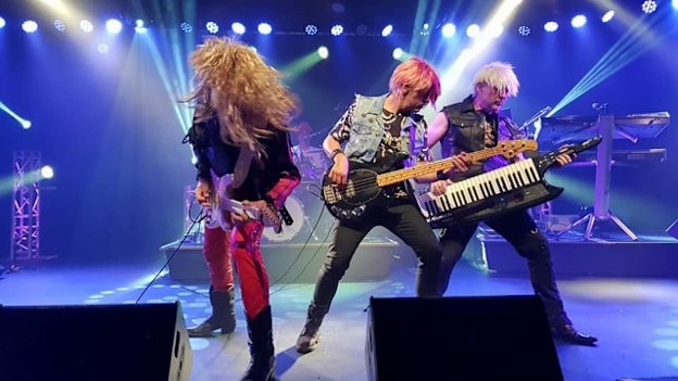 Jon Rouse (at right) in The Electric ’80s Show.