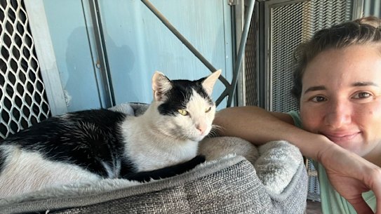 Melissa Mason with her house’s cat, Jorny.