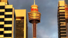 The Westfield logo is displayed on Centrepoint Tower in Sydney's CBD. 