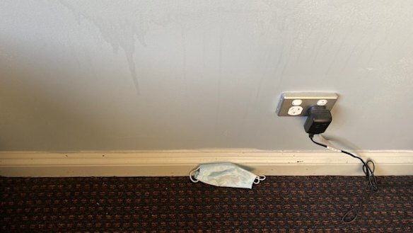 A returned traveller quarantined at Rydges found a discarded face mask on the floor of his room when he checked in.