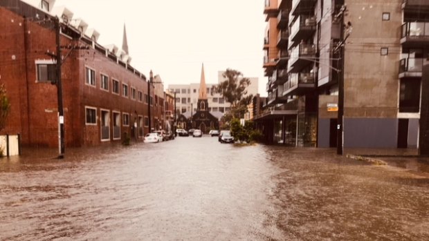 The apartment block (right) after rains hit Brunswick.