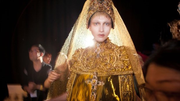 A model wearing a creation by Chinese fashion designer Guo Pei in the documentary Yellow is Forbidden. 