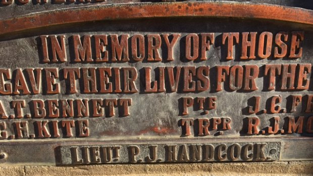 The Bathurst War Memorial with the name Peter Handcock on the plaque. 