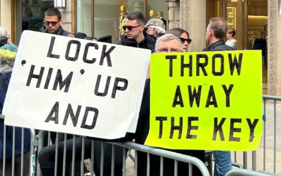 Bob Hoatson outside Trump Tower making his feelings about the ex-president known.