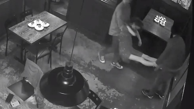 CCTV footage showed an unconscious woman being carried out of the restaurant.