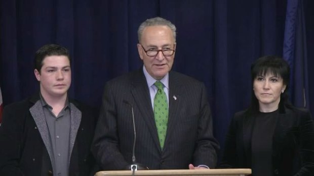 US Senator Chuck Schumer, with Rita Tolstykh, right, and her son in 2016, issued public pleas to US and Australian authorities to speed up extradition.