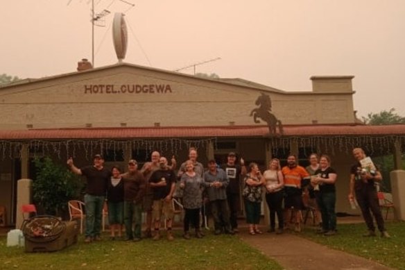 Locals outside the Cudgewa pub during last summer's bushfires. 