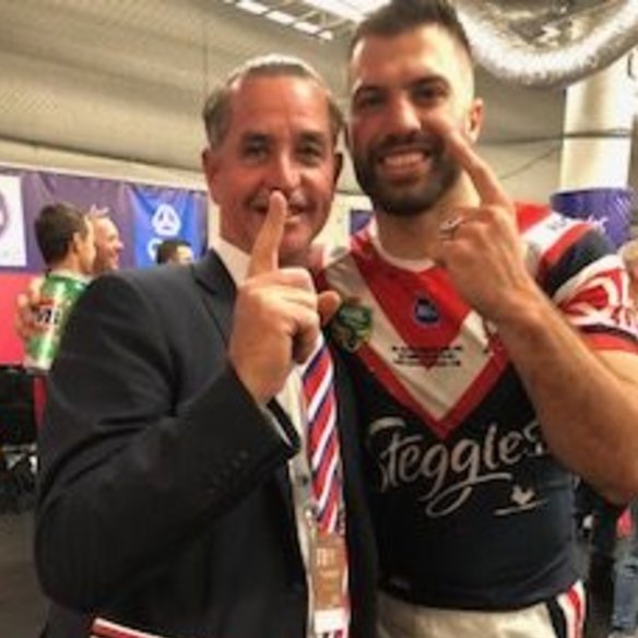 Coach Whisperer Bradley Charles Stubbs with James Tedesco after the Roosters' grand final win in 2018.