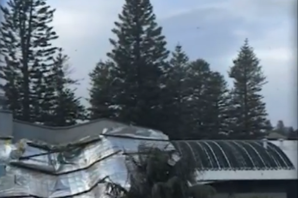 Damage to an apartment building roof in Cottesloe.