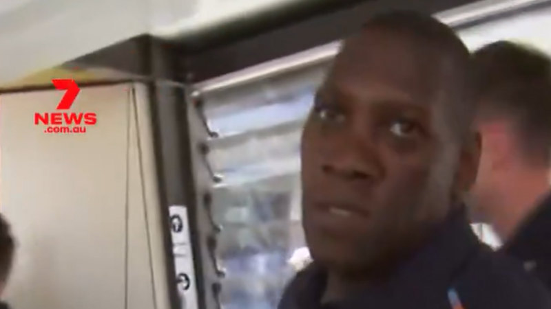 ‘Out of my face, mate’ England security guard clashes with a cameraman at Brisbane Airport