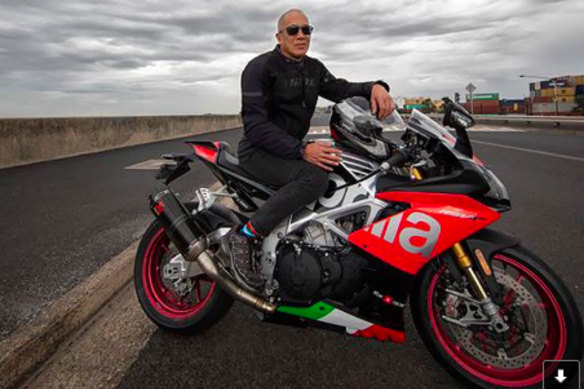 Charlie Teo and his motorcycle.