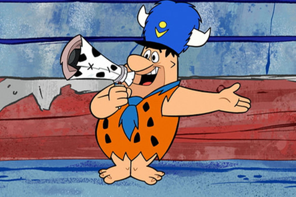 Not a troll: cartoon character Fred Flintstone with a megaphone.