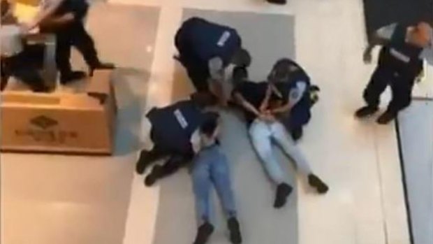 Police arrest youths allegedly carrying replica firearms in Chatswood's Westfield shopping centre. 
