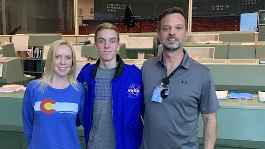 Jason Nitz with his son Harrison and wife Julie. 