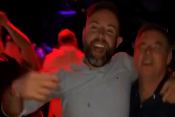 A still from a video purporting to show Ben Carter (left) and Sportsbet CEO Barni Evans (right) dancing in Darwin in early August 2022.