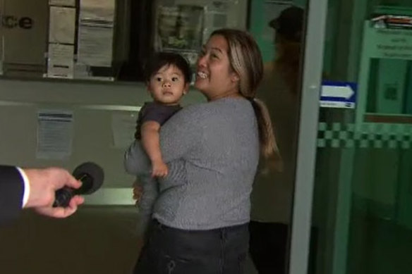 The mother and child are reunited at Cranbourne Police Station on Tuesday evening.