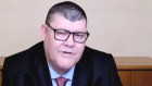 James Packer, pictured at the Crown Royal Commission hearing in October, has reaped a $111 million dividend from his private investment vehicle.