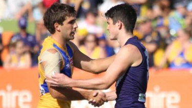 Andrew Gaff and Andrew Brayshaw shakes hands in a 2019 pre-season match ... their first clash since the incident.