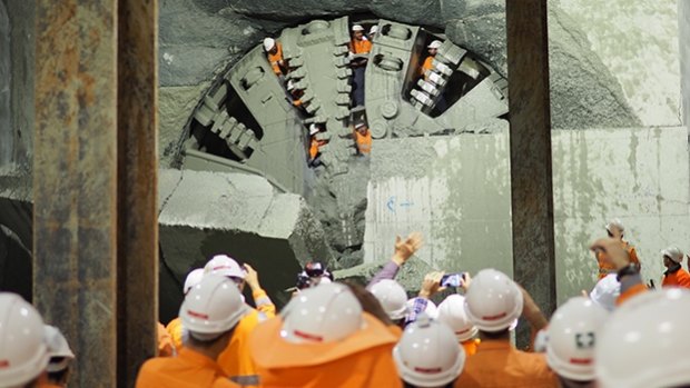 A tunnel boring machine on the new Forrestfield-Airport link, but questions are being asked over contamination of soil in the project.