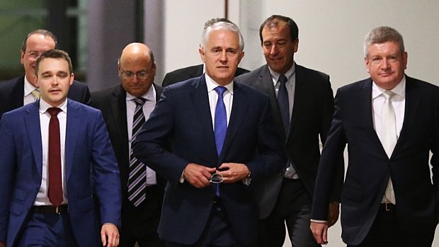 Malcolm Turnbull is escorted by his main backers to the leadership ballot, September 2015.