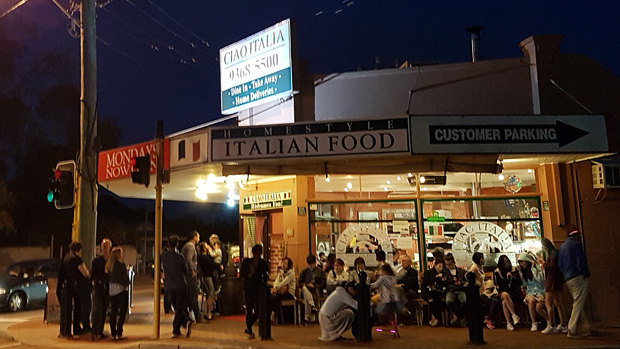 This quiet suburban corner is packed on a Thursday evening. 